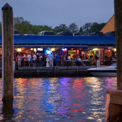 Lights from a party in Maryland’s capital, Annapolis transform the Chesapeake into an aquatic rainbow.