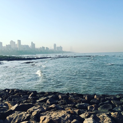 Apartment buildings along Mumbai’s coast are barely visible through the smog. Despite the pollution in this city of more than 20 million people, the Arabian Sea is a big draw for visitors from across India and the rest of the world.